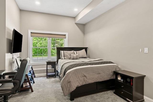 bedroom featuring recessed lighting, baseboards, and light colored carpet