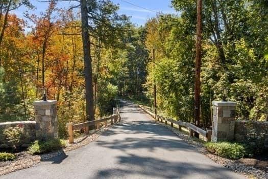 view of road with a view of trees