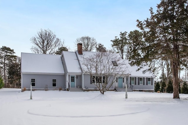 view of front of property featuring a chimney