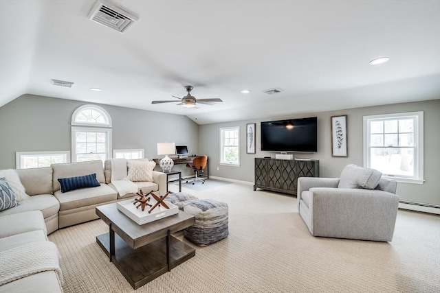 living room with visible vents, vaulted ceiling, and light carpet