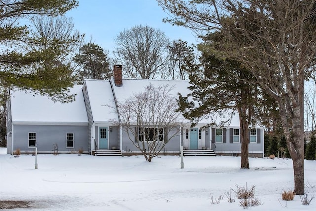 view of front of home with a chimney