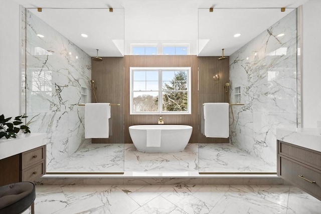 bathroom featuring vanity, wood walls, and shower with separate bathtub