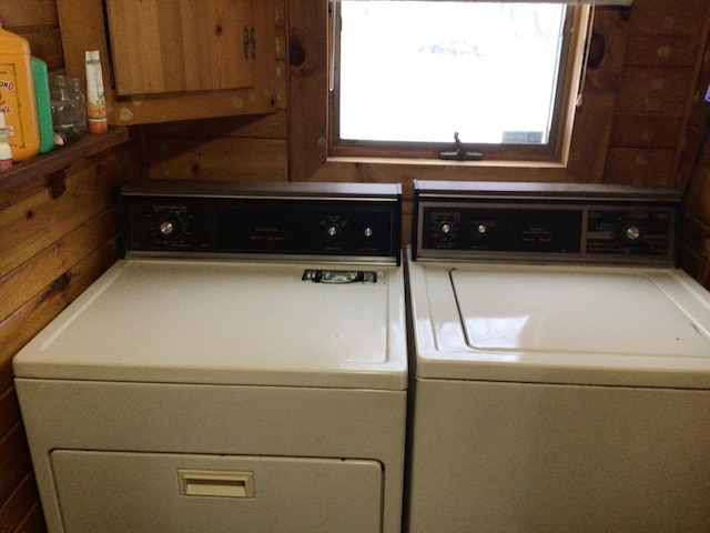 laundry area with laundry area and separate washer and dryer