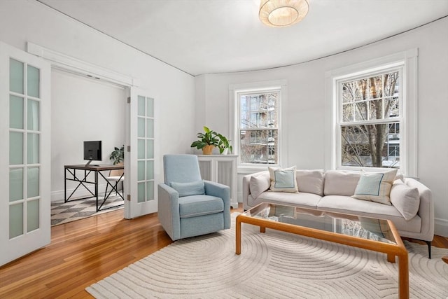 living area with wood finished floors