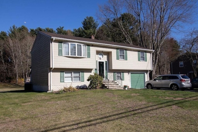 272 S Precinct, Taunton, MA 02718 - bi-level home featuring a front lawn and a garage