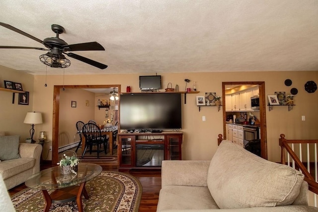272 S Precinct, Taunton, MA 02718 - living area featuring ceiling fan, wood finished floors, and baseboard heating