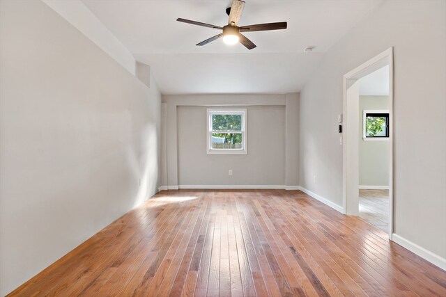 spare room featuring light hardwood / wood-style floors and ceiling fan