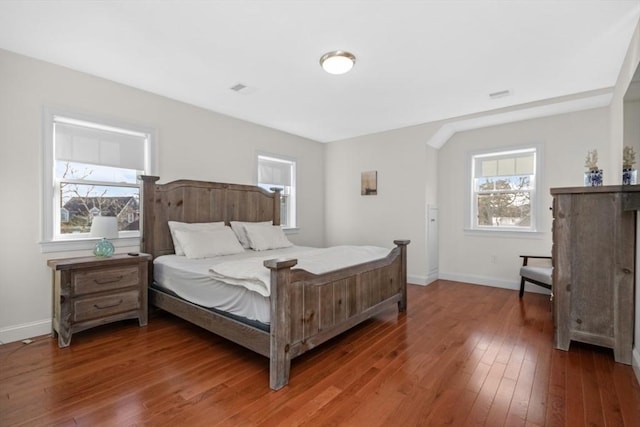 bedroom featuring dark wood-type flooring