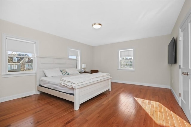 bedroom featuring wood-type flooring