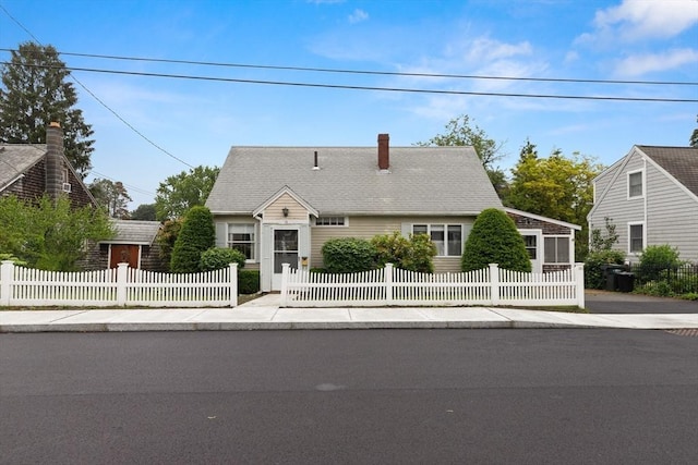 14 Farrell St, Newburyport, MA 01950 - cape cod home with a chimney and a fenced front yard