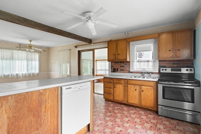 14 Farrell St, Newburyport, MA 01950 - kitchen with electric stove, white dishwasher, ceiling fan, light countertops, and healthy amount of natural light