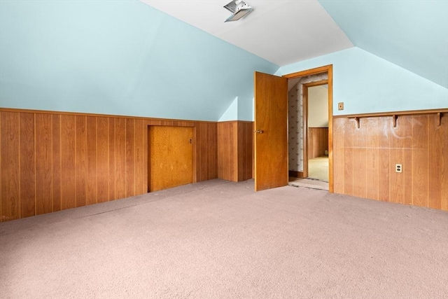 14 Farrell St, Newburyport, MA 01950 - bonus room with vaulted ceiling, light carpet, wooden walls, and wainscoting