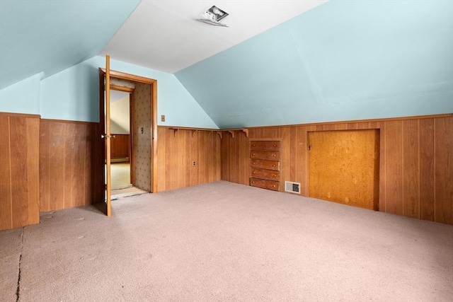 14 Farrell St, Newburyport, MA 01950 - bonus room featuring wooden walls, vaulted ceiling, carpet, and a wainscoted wall
