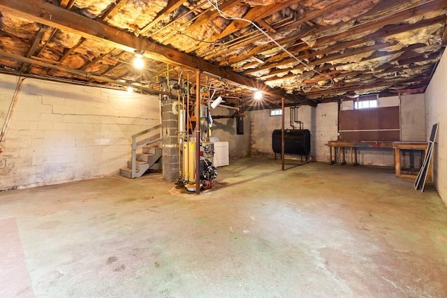 14 Farrell St, Newburyport, MA 01950 - basement with oil tank, stairs, a heating unit, and washer / clothes dryer