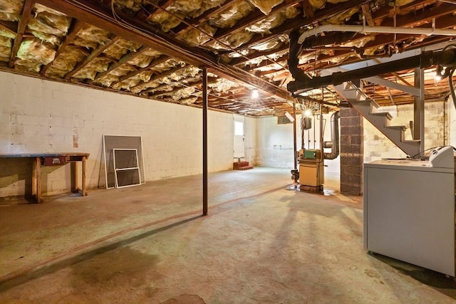 14 Farrell St, Newburyport, MA 01950 - unfinished basement with stairs, concrete block wall, and a heating unit
