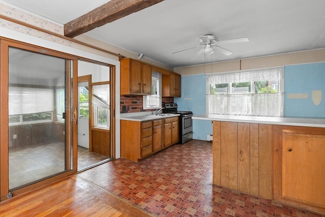 14 Farrell St, Newburyport, MA 01950 - kitchen featuring stainless steel range with electric stovetop, light countertops, a ceiling fan, and brown cabinets