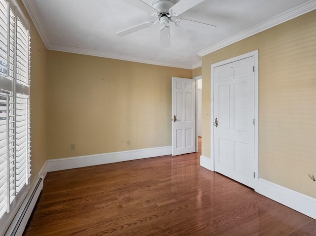 unfurnished bedroom with crown molding, baseboard heating, dark hardwood / wood-style floors, a closet, and ceiling fan