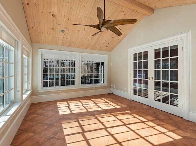 unfurnished sunroom with french doors, ceiling fan, wood ceiling, and vaulted ceiling with beams