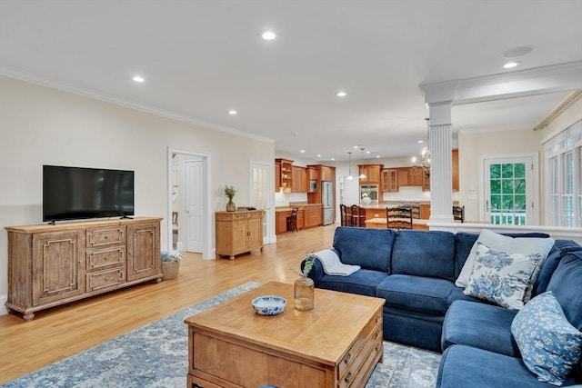 3 Aaron Rd, Lexington, MA 02421 - living area featuring decorative columns, crown molding, light wood-style floors, and recessed lighting