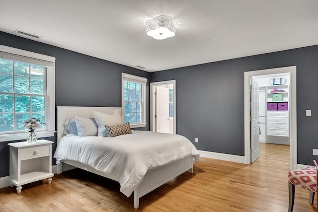 3 Aaron Rd, Lexington, MA 02421 - bedroom with light wood-style flooring and baseboards