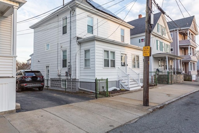 view of front of property with fence