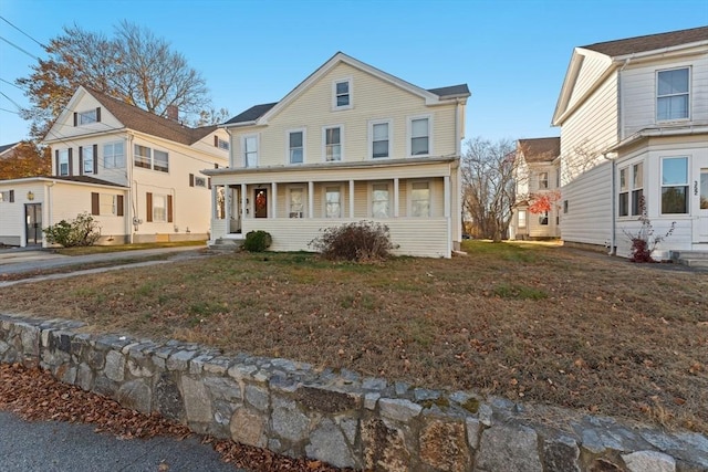 view of front facade with a front lawn