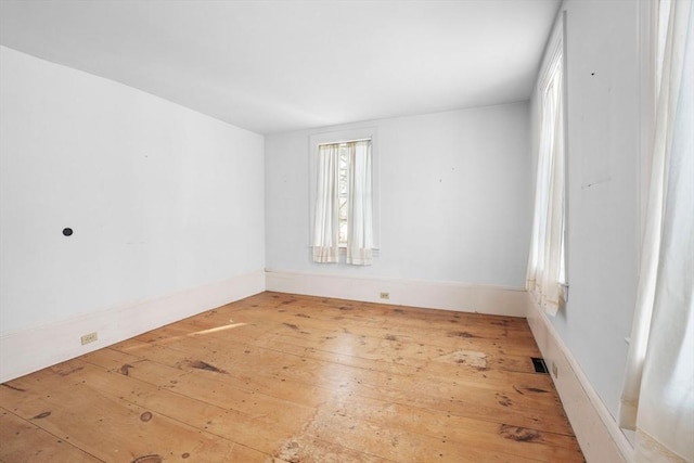 empty room with light wood-type flooring