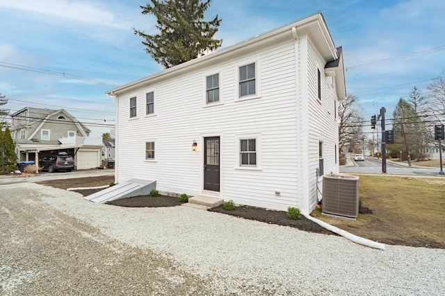 view of front of property with cooling unit