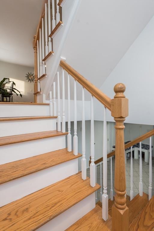 stairs with wood-type flooring