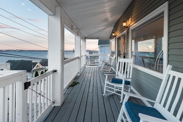 deck at dusk with a water view