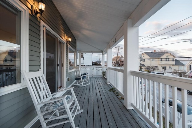 wooden deck featuring covered porch