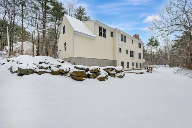 view of snow covered property