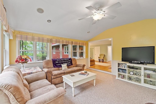 carpeted living area featuring vaulted ceiling, a ceiling fan, and recessed lighting