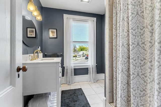 full bath featuring a shower with curtain, tile patterned floors, vanity, and visible vents