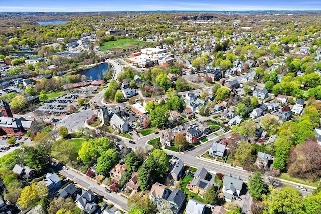 birds eye view of property featuring a residential view and a water view