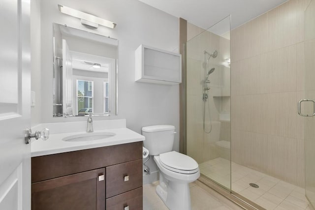 870 E 4th St Unit 1, Boston, MA 02127 - bathroom with a stall shower, vanity, and tile patterned flooring