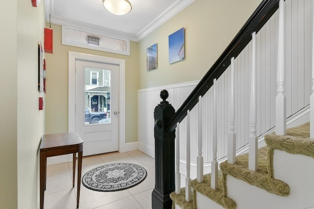 870 E 4th St Unit 1, Boston, MA 02127 - foyer entrance featuring stairs, crown molding, and light tile patterned flooring