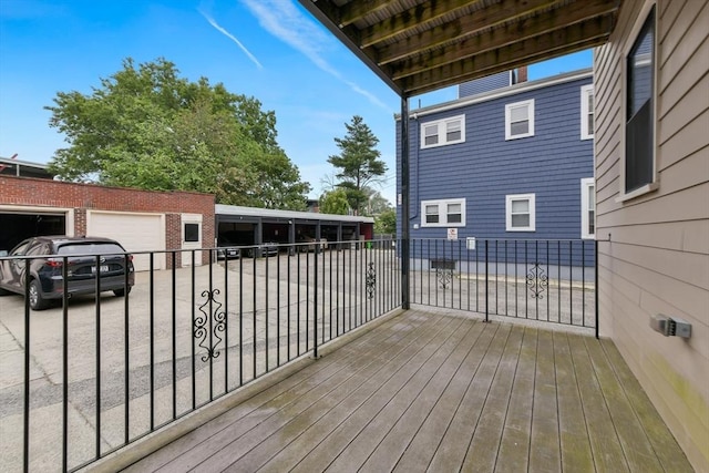 870 E 4th St Unit 1, Boston, MA 02127 - wooden deck featuring an attached garage