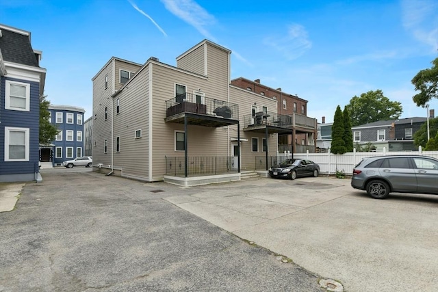 870 E 4th St Unit 1, Boston, MA 02127 - view of home's exterior featuring uncovered parking