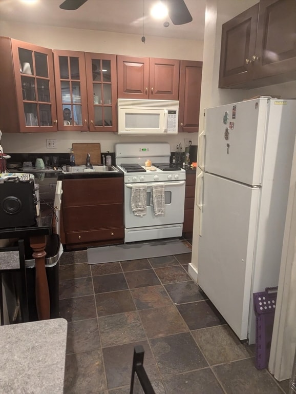 kitchen with ceiling fan and white appliances