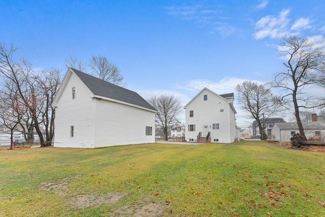 exterior space with a lawn and an outdoor structure