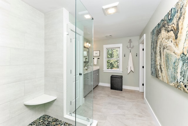 bathroom featuring vanity and walk in shower