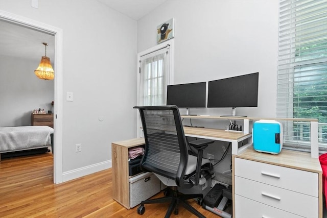 112 Thornton St Unit 2, Boston, MA 02119 - office area featuring healthy amount of natural light, light wood-type flooring, and baseboards