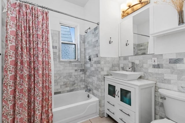 112 Thornton St Unit 2, Boston, MA 02119 - full bathroom featuring shower / tub combo, tile walls, toilet, vanity, and tile patterned flooring