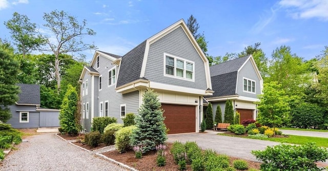 321-323 Lake Ave Unit 323, Newton, MA 02461 - view of front of home featuring a gambrel roof, a garage, and asphalt driveway