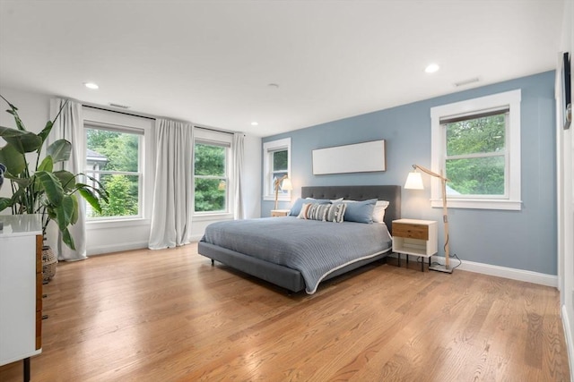 321-323 Lake Ave Unit 323, Newton, MA 02461 - bedroom with baseboards, light wood-style flooring, and recessed lighting