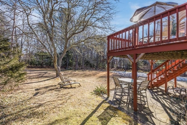 view of yard with a patio and a deck