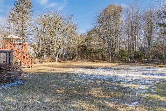 view of yard with a wooden deck