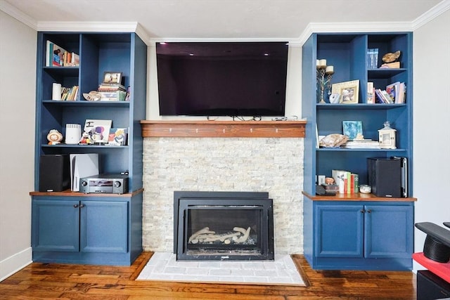 93 Bank St, North Attleboro, MA 02760 - living area with wood finished floors, ornamental molding, built in shelves, and a fireplace