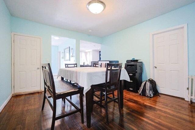 93 Bank St, North Attleboro, MA 02760 - dining space with dark wood-style flooring and baseboards
